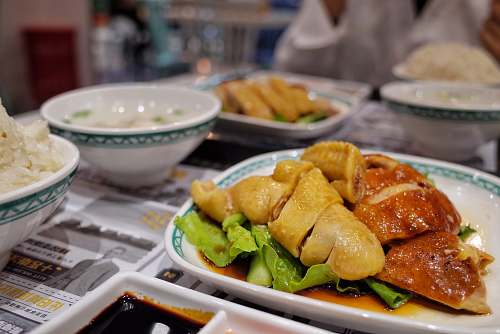 meal selective focus photography of plate of food on table dish