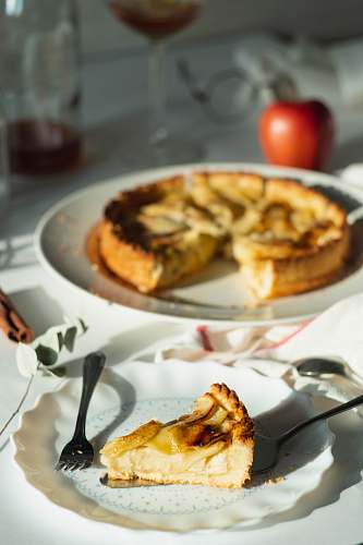dessert shallow focus photo of sliced desert on white ceramic plate cake