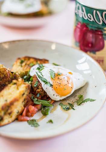 plate shallow focus photography of sunny-side up egg dish