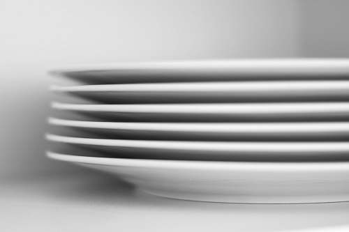 black-and-white six piled white ceramic plates dish