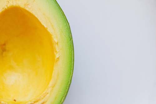 fruit sliced avocado against white background avocado