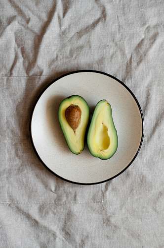 plant sliced avocado on plate fruit