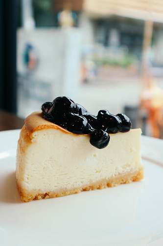plant sliced cake with berries on top fruit