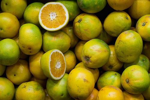 fruit sliced green lemons orange