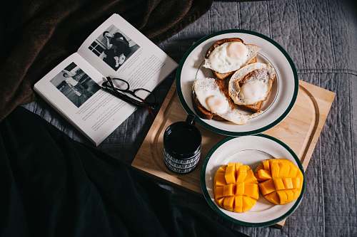 meal sliced mangoes served on white ceramic plate breakfast
