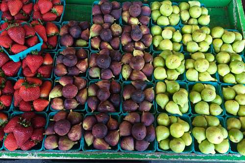 fruit strawberry, fig, and green fig on display strawberry