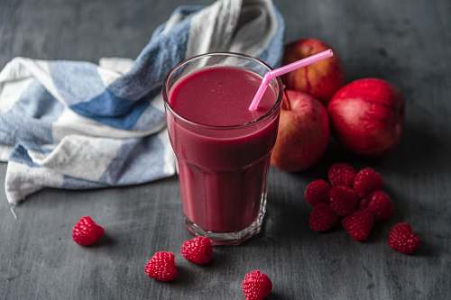 fruit strawberry juice beside strawberry fruits raspberry