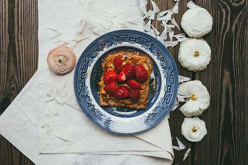 toast strawberry serve on blue plate flowers
