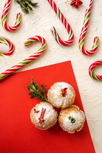 sweets three cupcakes on red paper confectionery