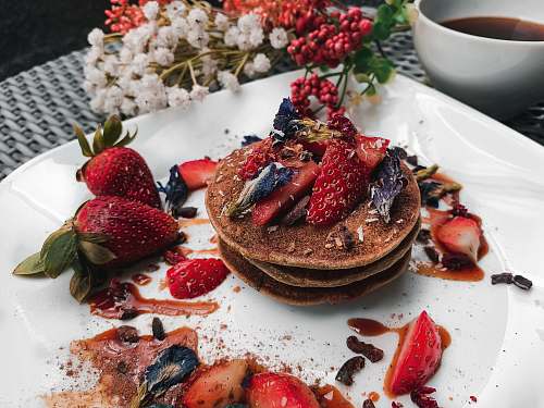 bread three pancakes topped with berries pancake