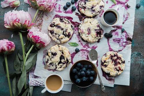flower top view photography of blueberry cakes peony