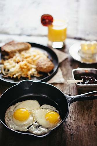 meal two fried eggs on skillet breakfast