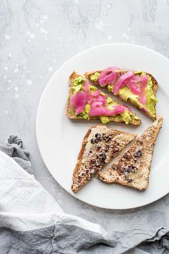 bread two vegetable sandwiches on white plate toast