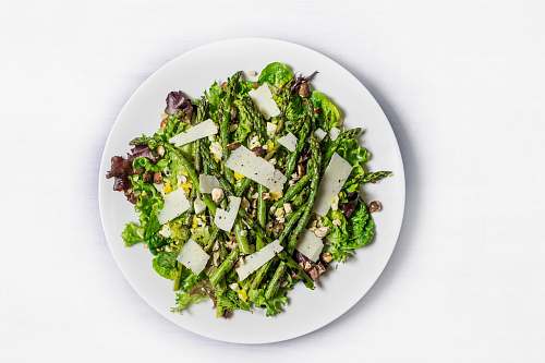 plant vegetables on ceramic plate asparagus