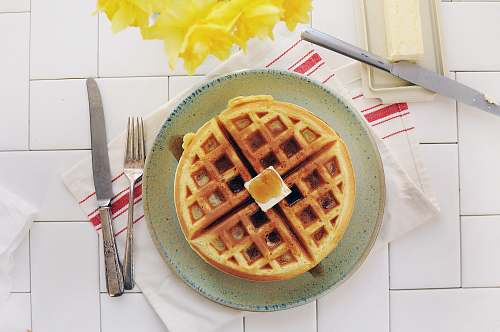 waffle waffle on gray ceramic plate syrup