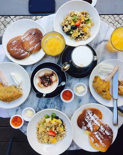 meal waffles on plate near fried chickens and drinks breakfast
