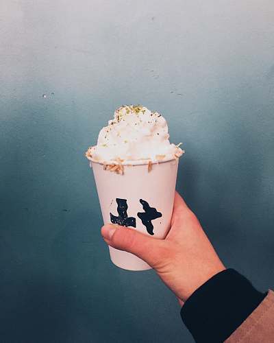 dessert white ice cream on cup person