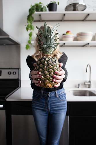fruit woman holding pineapple pineapple