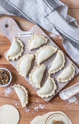 ravioli wrapped foods on tray pasta