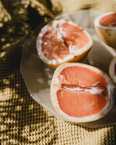 grapefruit fruits served on plate citrus fruit