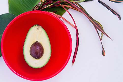 food guacamole in red bowl avocado