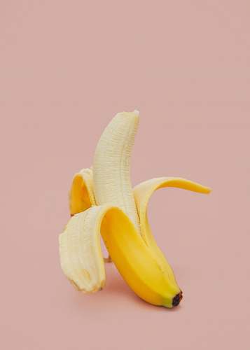 food half peeled banana fruit banana