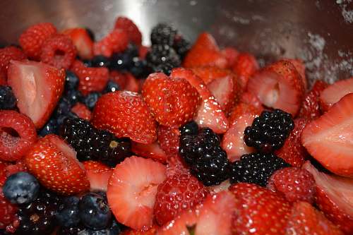 food sliced strawberries blueberry