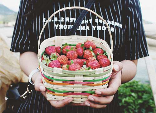 food woman holding basket of strawberries strawberry