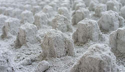 flour macro photography of stone formations powder