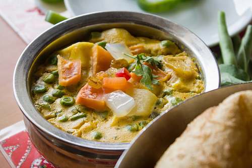 bowl vegetable soup in gray bowl dish