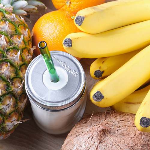 food clear glass mason jar beside orange fruit and banana fruits fruit