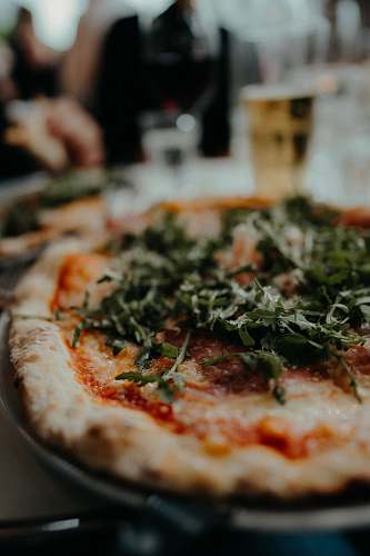 food green fern plant on pizza pizza