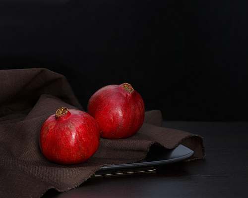fruit two red pomegranates food