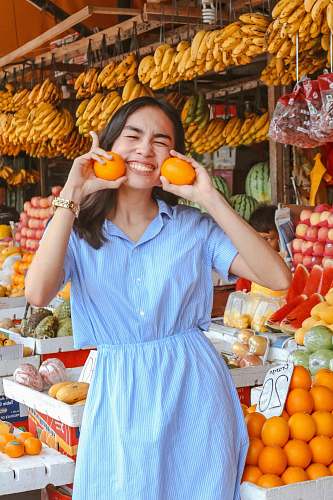 food woman in blue dress fruit