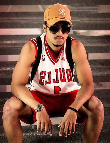 accessory man wearing white and red Chicago Bulls Derrick Rose 1 jersey shirt sunglasses