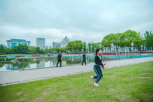 human boy playing in open area person