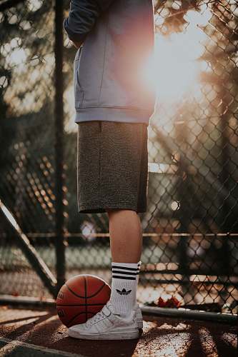 clothing boy wearing grey shorts skirt