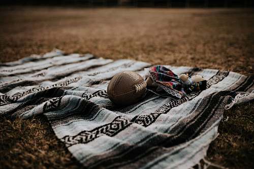 clothing brown football on grey textile sport