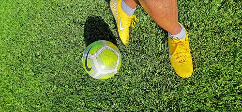 clothing green and white Nike soccer ball footwear