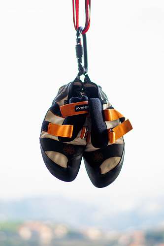 clothing pair of black-and-gray shoes helmet