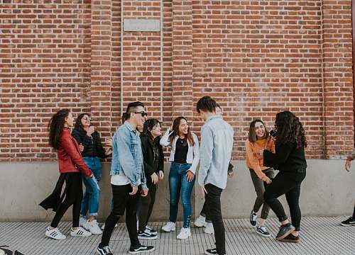 clothing people standing near building shoe