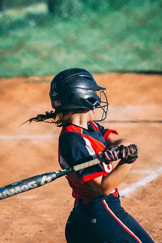 clothing person playing baseball helmet