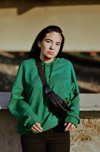 clothing woman wearing green sweatshirt sleeve