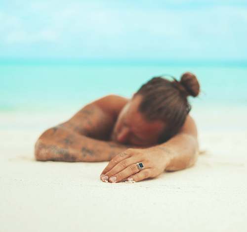 maldives man wearing silver-colored ring ocean