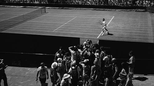wimbledon grayscale photo of person playing tennis united kingdom