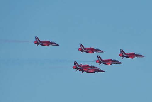 transportation five red-and-black fighter jets biplane