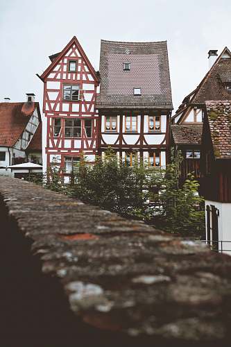 cottage architectural photography of white and brown house house