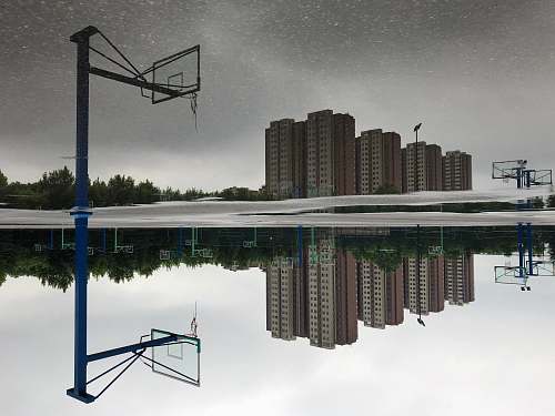 city photography of brown high-rise building during daytime high rise