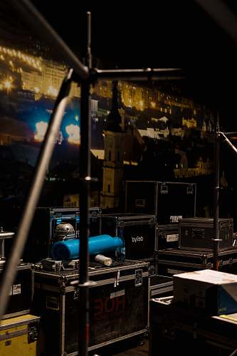 camera pile of black train cases electronics