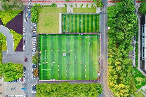 field top view photography green football field daji central street 2nd alley